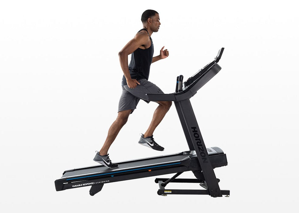 Treadmill in use by a male at a full incline in space