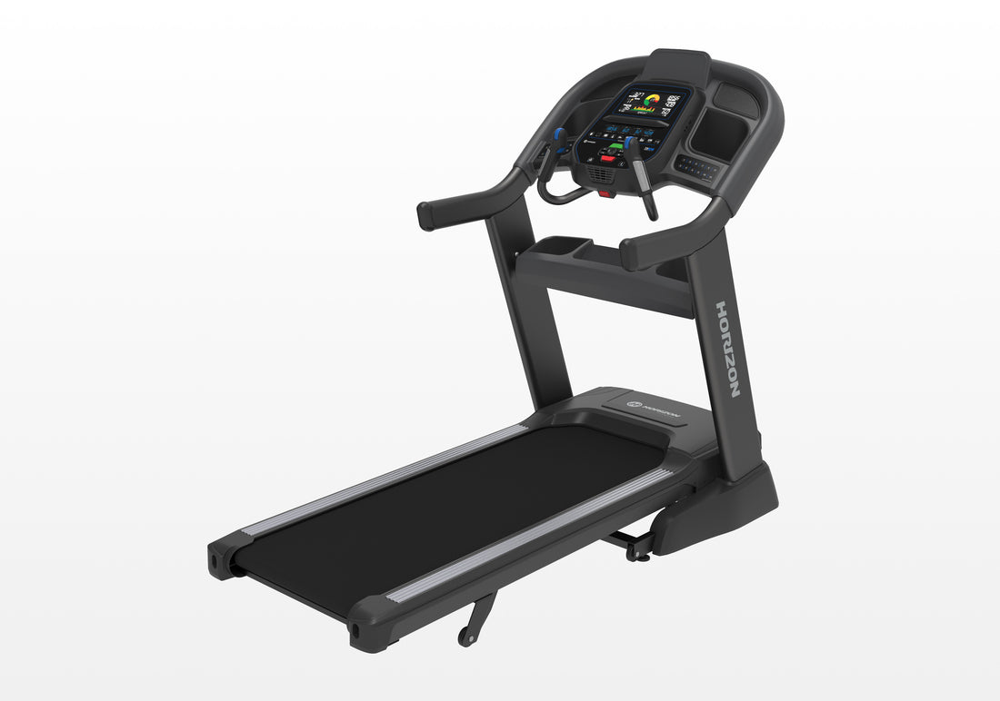 Black treadmill with digital display on a white background